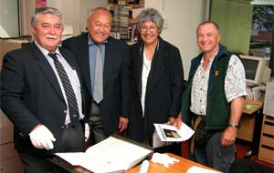 Stanley Pardoe, Toko Riki, Colleen Hawkins and Alec Jones viewing the Visitors' Book in 2004